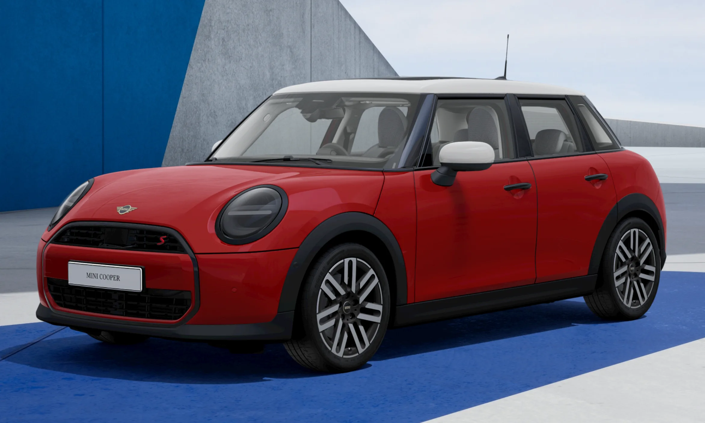 Novo Mini Cooper S de cinco portas vermelho com teto branco e fundo azulado