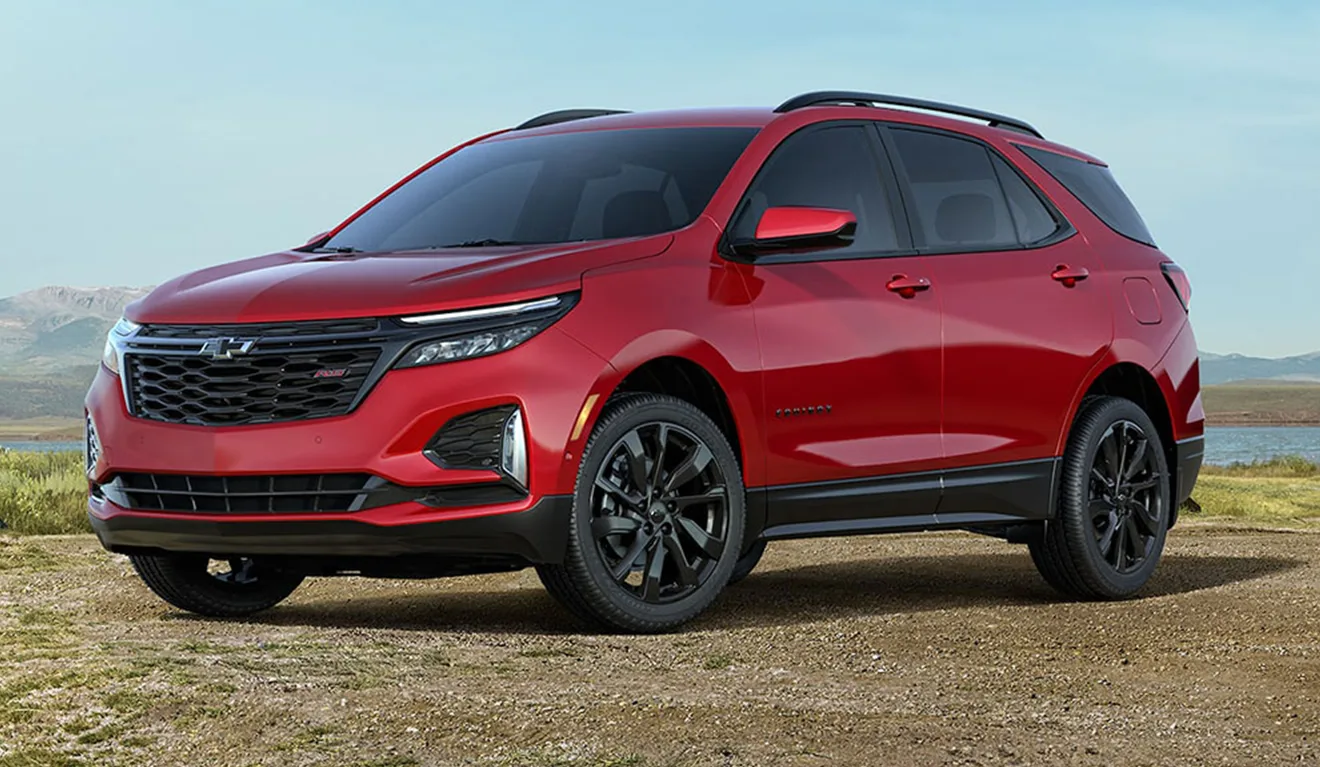 Chevrolet Equinox 2024 - SUV vermelho com paisagem de fundo