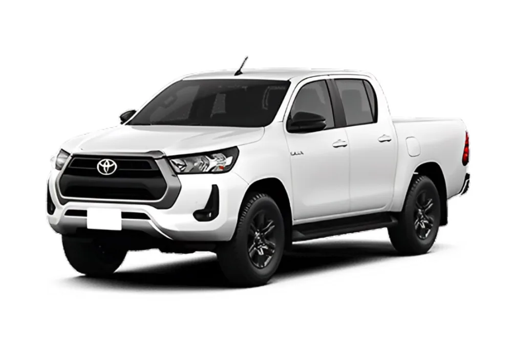 Toyota Hilux SR automática branca vista de frente e com fundo branco