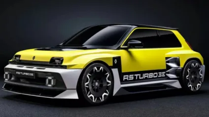 Renault R5 Turbo 3E Concept amarelo com partes pretas, visto de frente e com fundo escuro