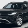 Volkswagen T-Cross Sem Nome 200 TSI preto, visto de frente, com faróis e DRL's acesos e fundo claro