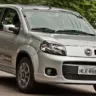 Fiat Uno Sporting duas portas prata de frente andando rápido