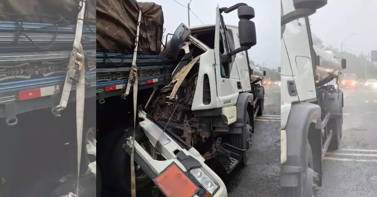 Acidente entre dois caminhões, com um deles destruído e visto de frente