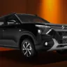 Citroën C3 Dark Edition preto de frente em um fundo laranja