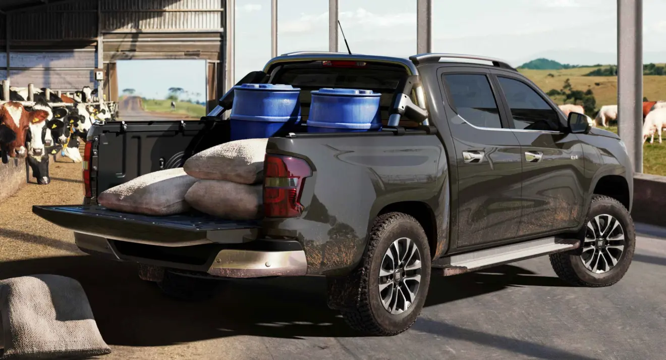 Fiat Titano Ranch 2026 cinza parada de traseira com a tampa da caçamba aberta